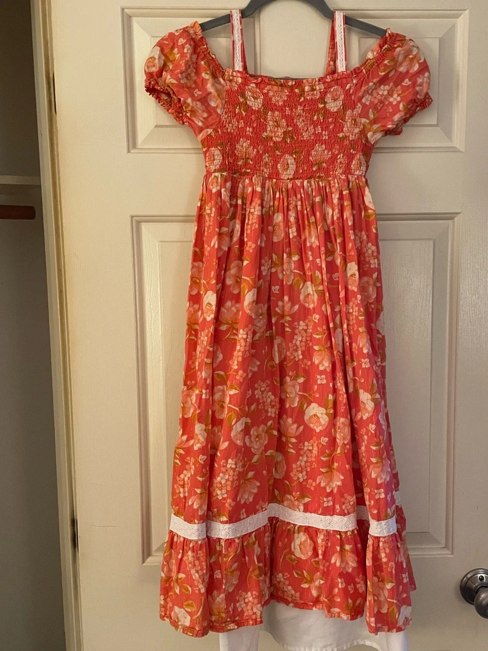 Girls coral floral dress Haute Hippie w/ a smocked bodice, puff sleeve…